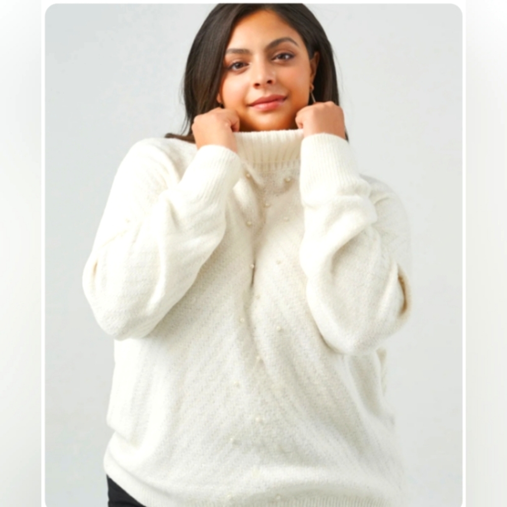 Beautiful pullover with pearl accents